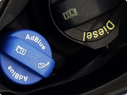 Locate the  AdBlue® tank