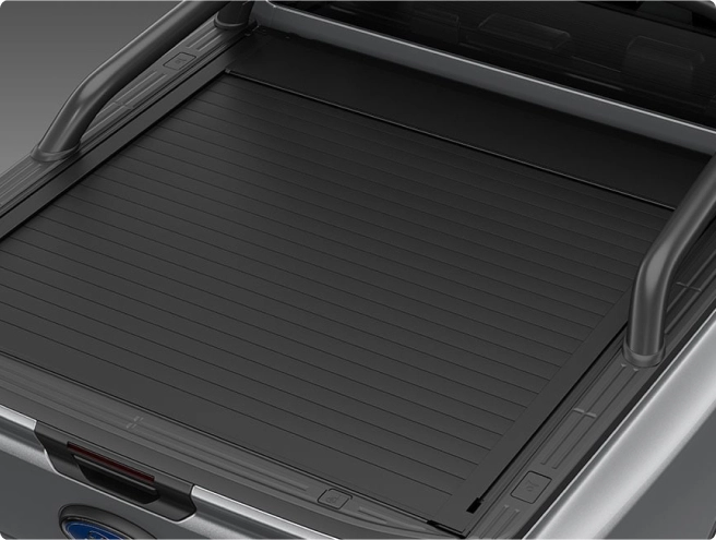 Top-down view of a grey Ford Ranger truck bed with a black slatted roll-up tonneau cover and a grey sports bar.