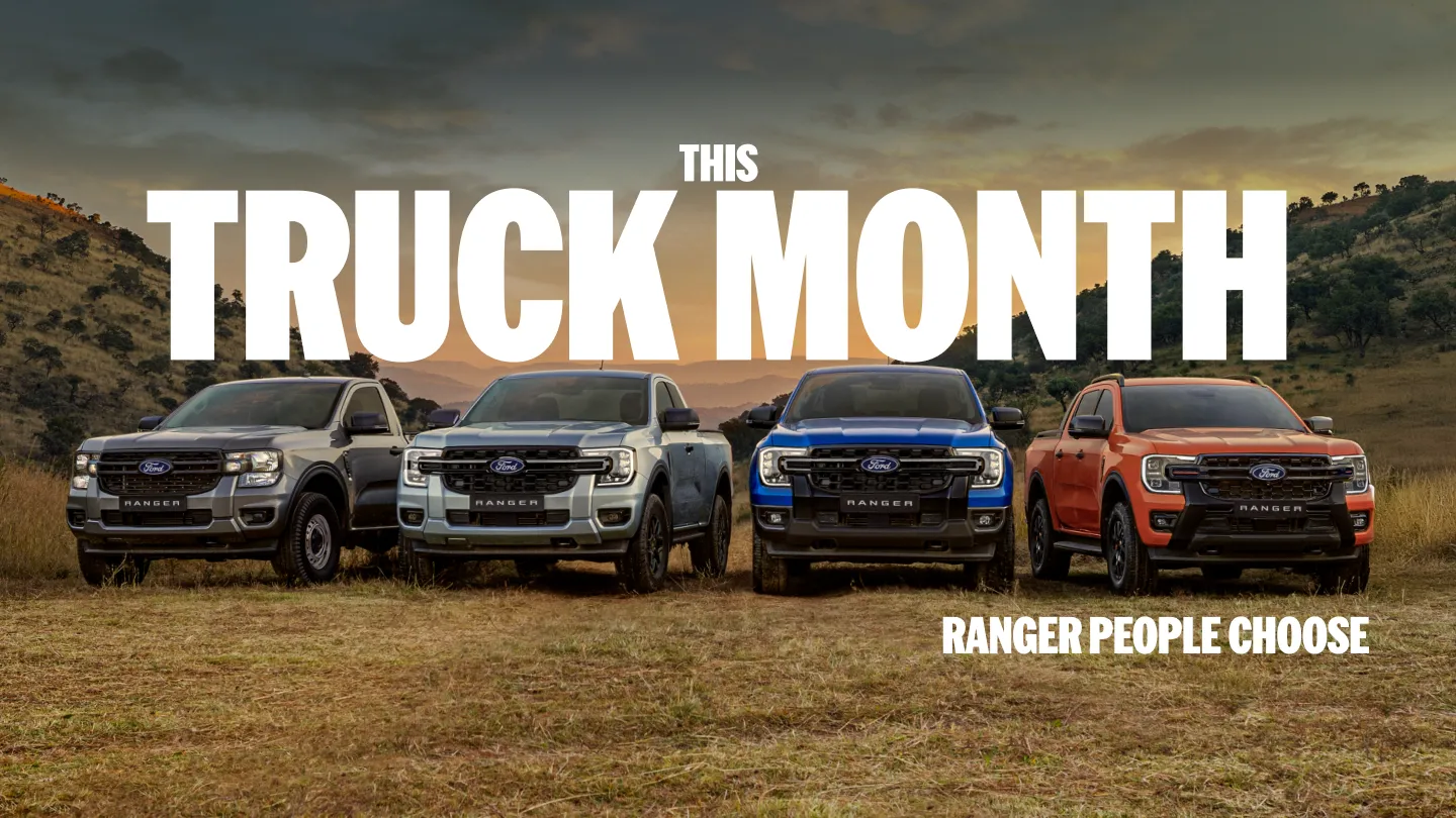 Ford Ranger truck lineup displayed outdoors with multiple variants at sunset