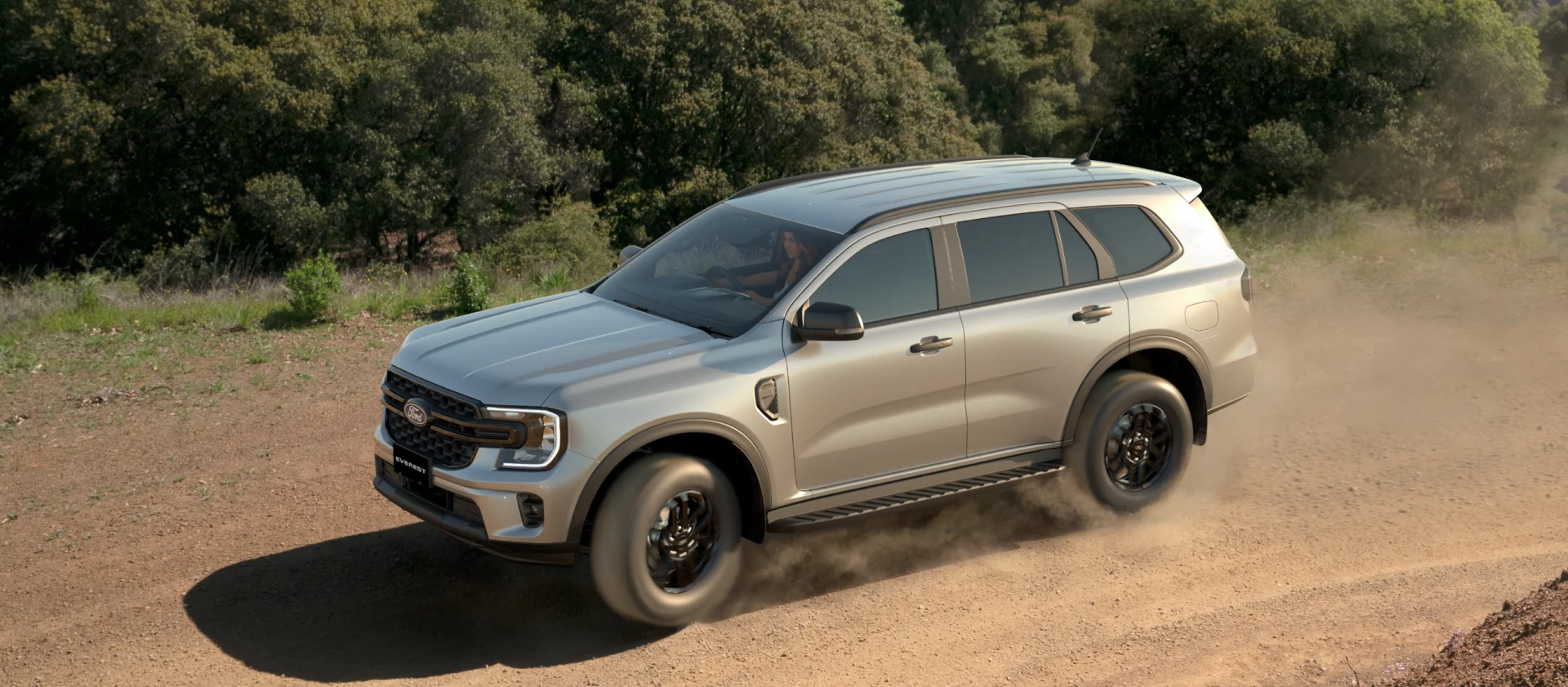 Ford Everest Active driving on dusty off-road trail