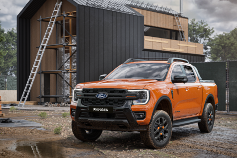 An orange Ford Ranger parked outside