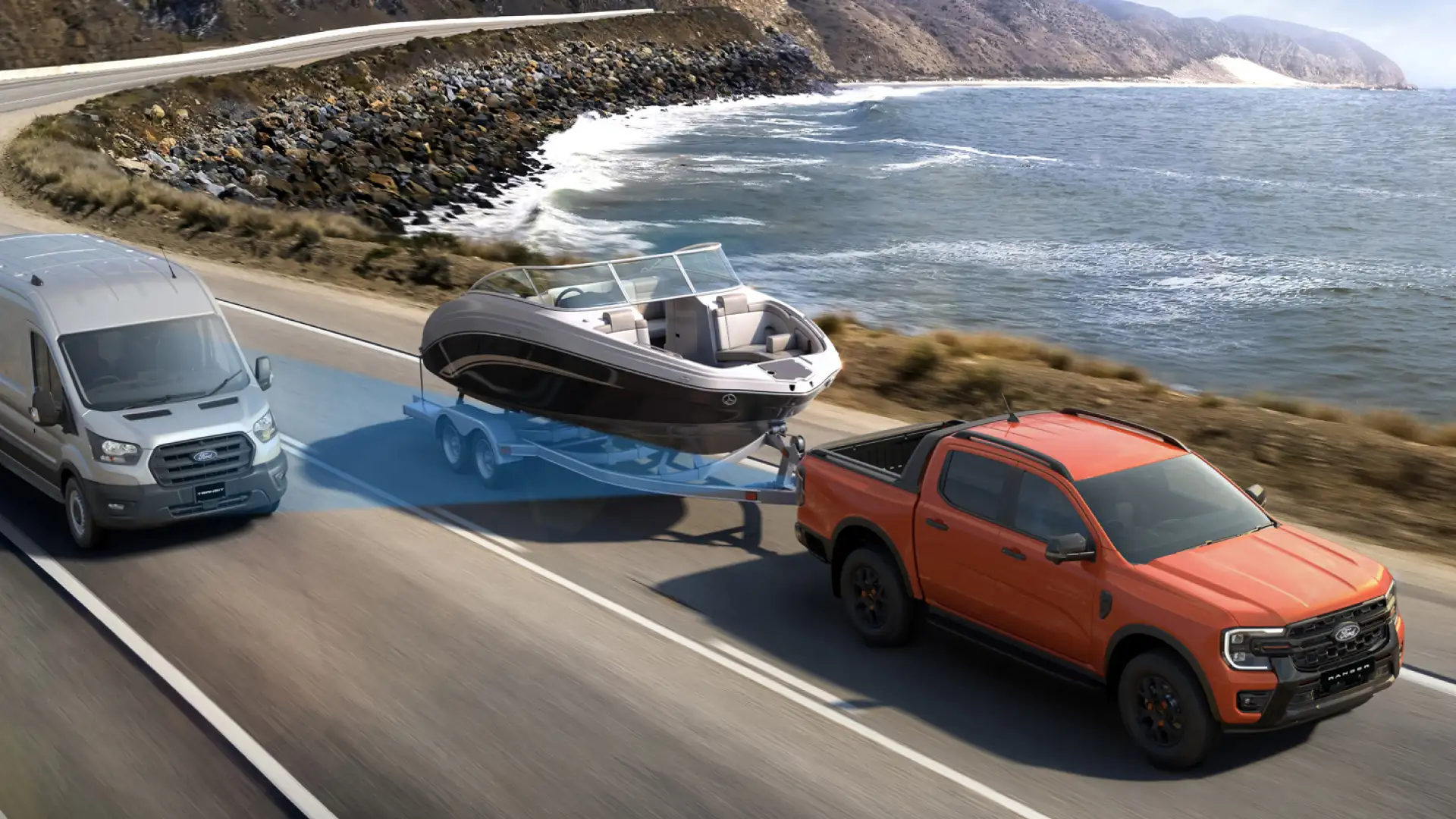 Ford Ranger towing boat on coastal highway.