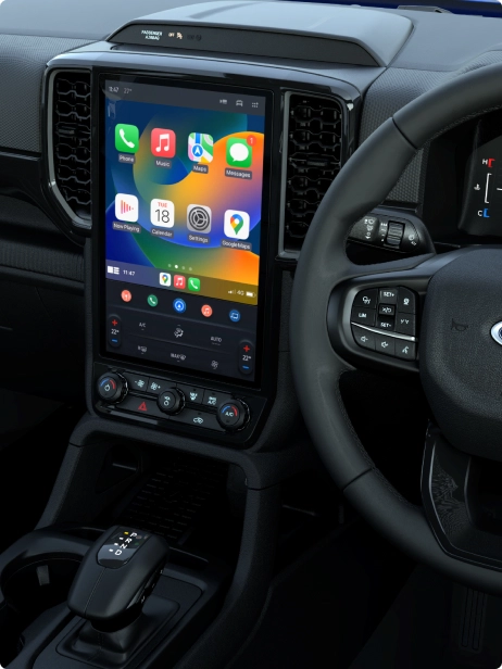 Ford interior featuring a digital dashboard and a large touchscreen with Apple CarPlay
