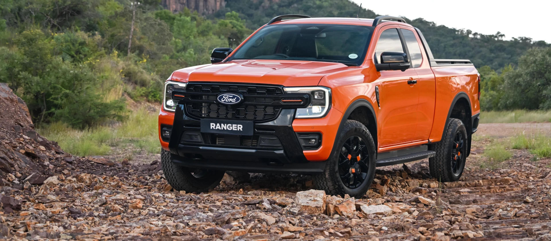 Ignite orange ford ranger wildtrak parked outdoors