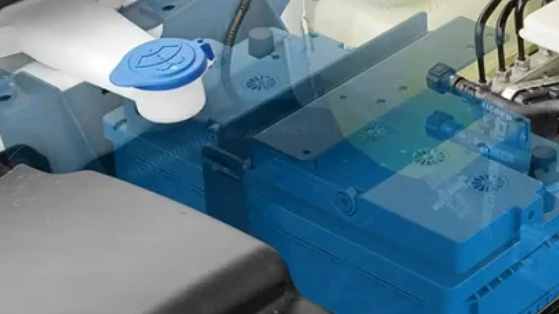 close up of under hood battery system