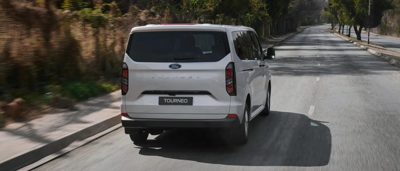 Ford Tourneo Car back side on the highway