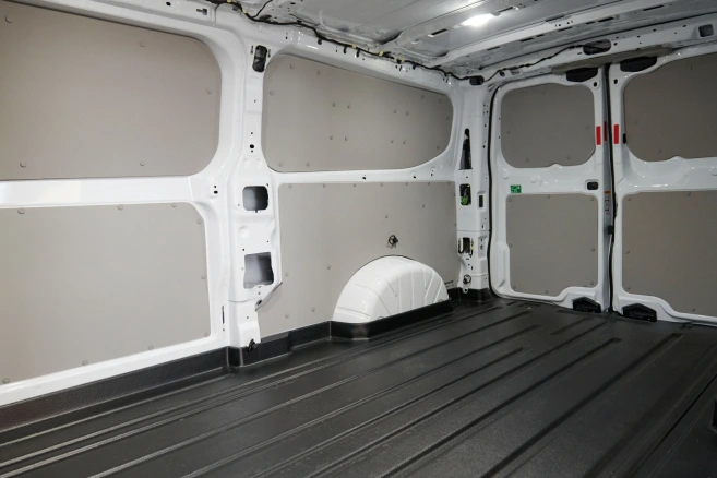 Interior cargo hold of white Ford Transit van