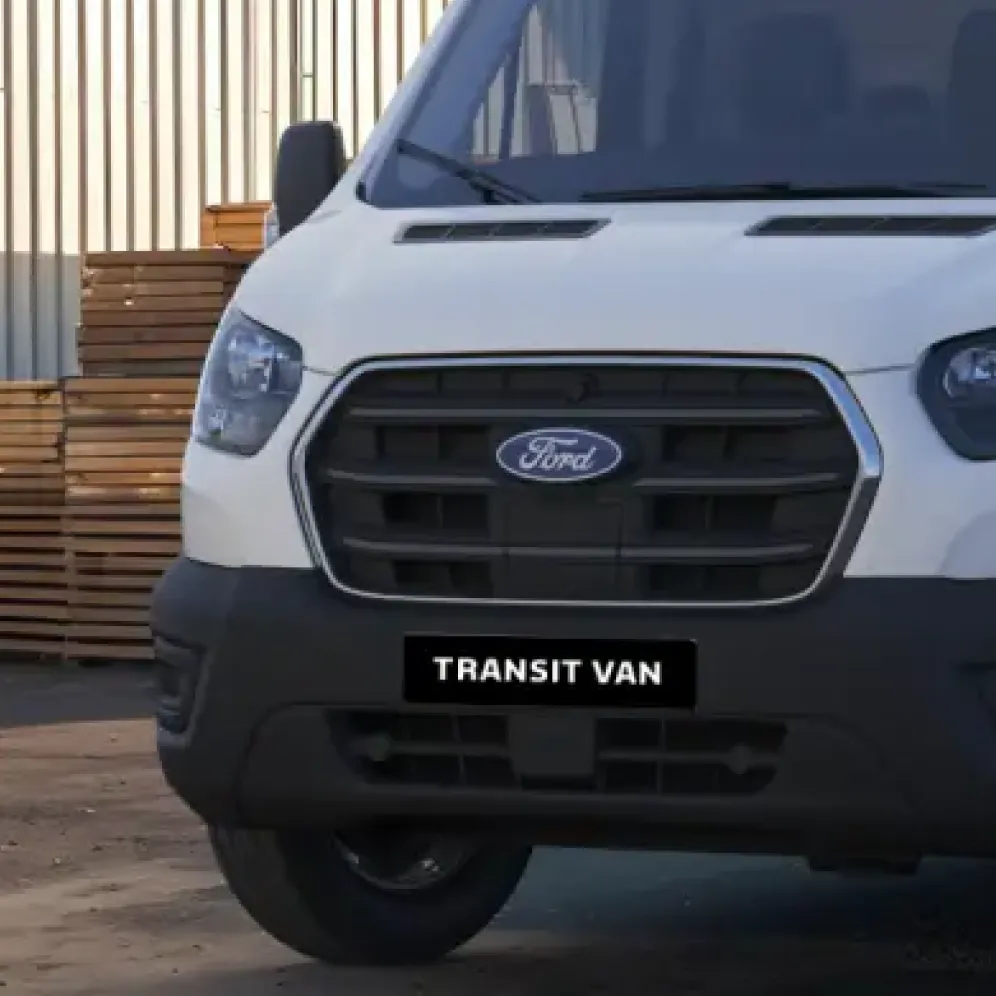 Front grille close-up of white Ford Transit van
