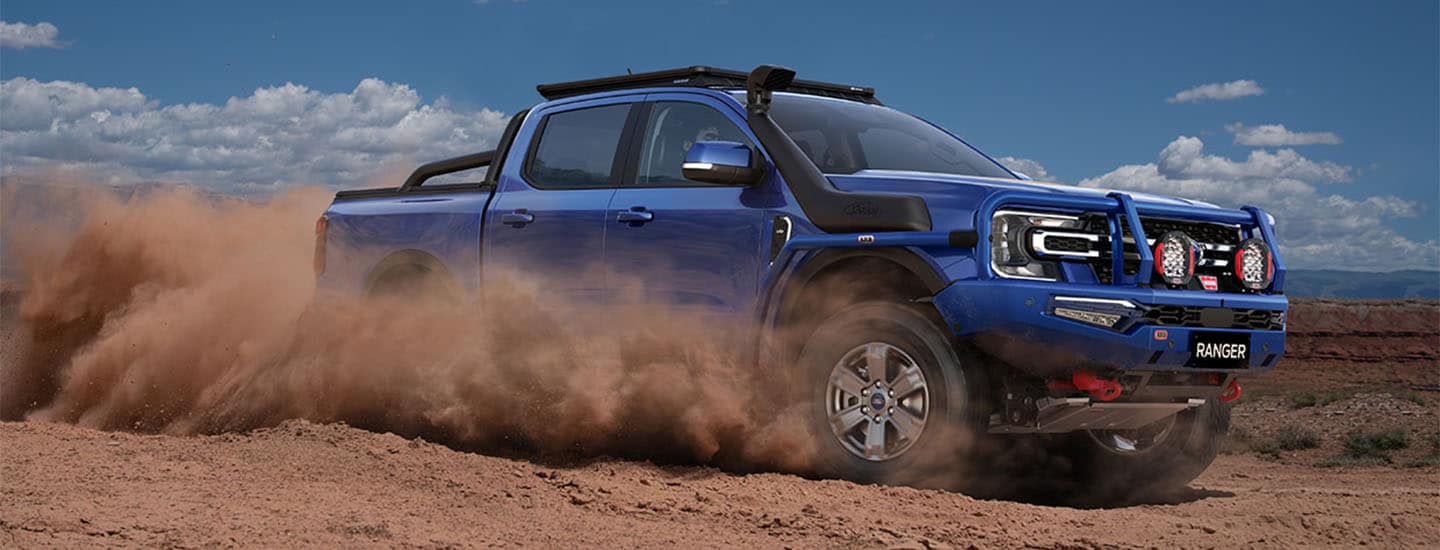 Blue Ford Ranger in Desert